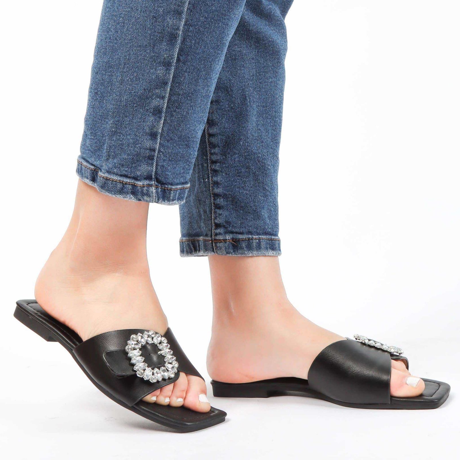 Reya – Sandales plates en Noir.