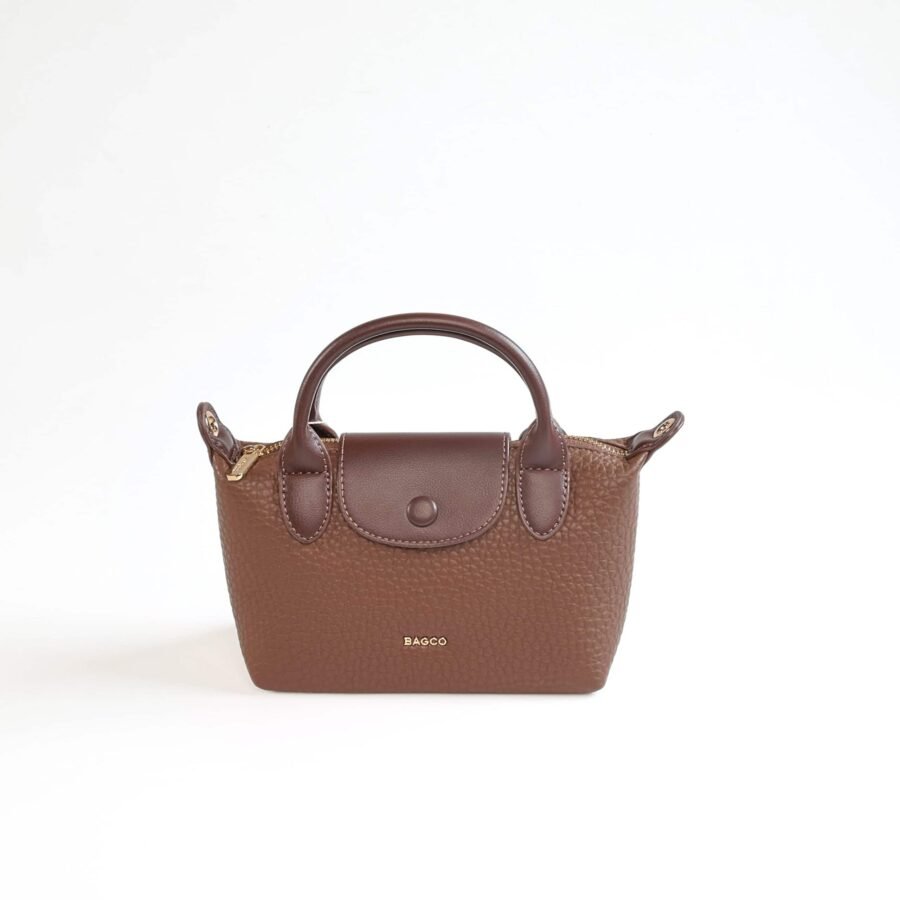 Sac à main en cuir marron avec poignée robuste, idéal pour un style chic et fonctionnel..