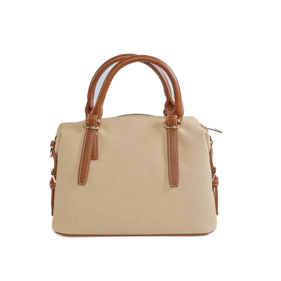 Sac à main en toile beige avec poignées en cuir marron, idéal pour un look chic et fonctionnel..