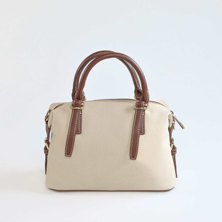 Sac à main beige avec poignées en cuir marron, parfait pour un style chic et fonctionnel..