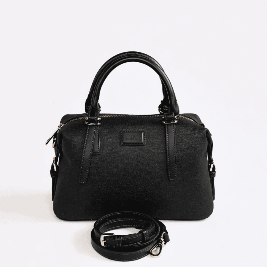 Sac à main en cuir noir avec poignée et bandoulière amovible, élégant et pratique, idéal pour un sty..