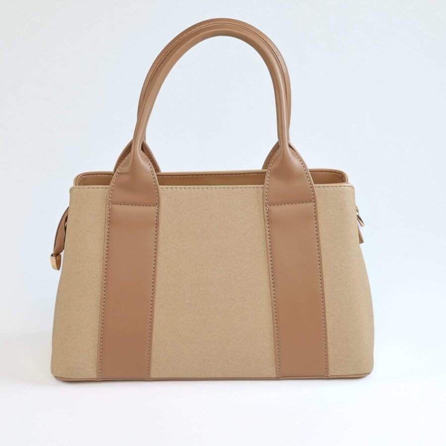Vela – Sac à main en Beige.