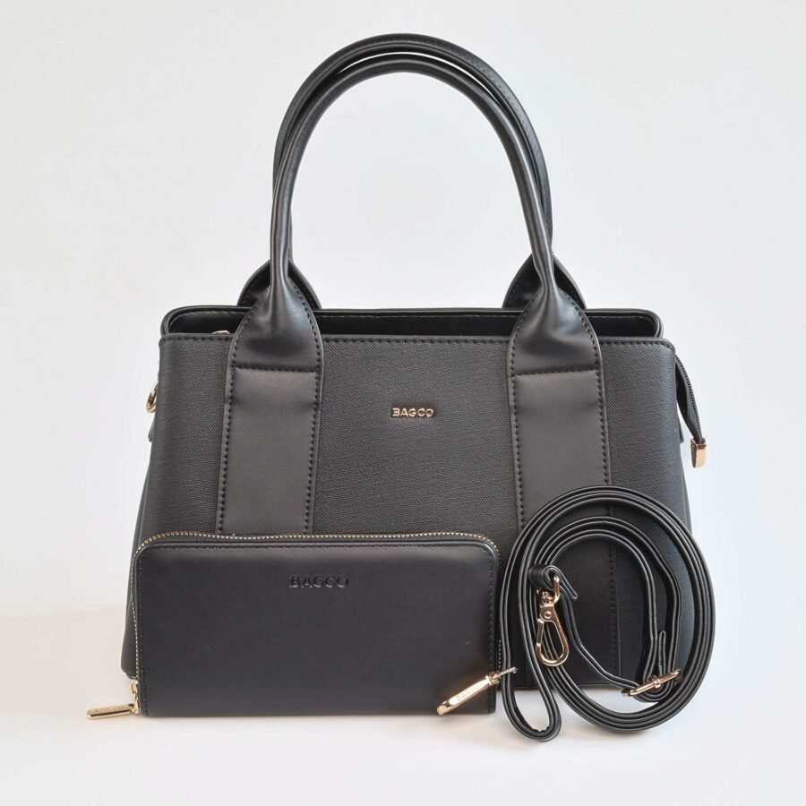 Sac à main en cuir noir avec poignées et accessoires dorés, idéal pour un style chic et sophisti..