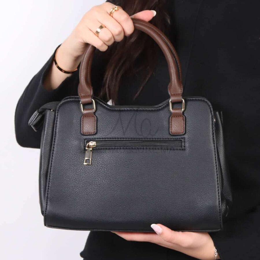 Chic – Sac à main en Noir.