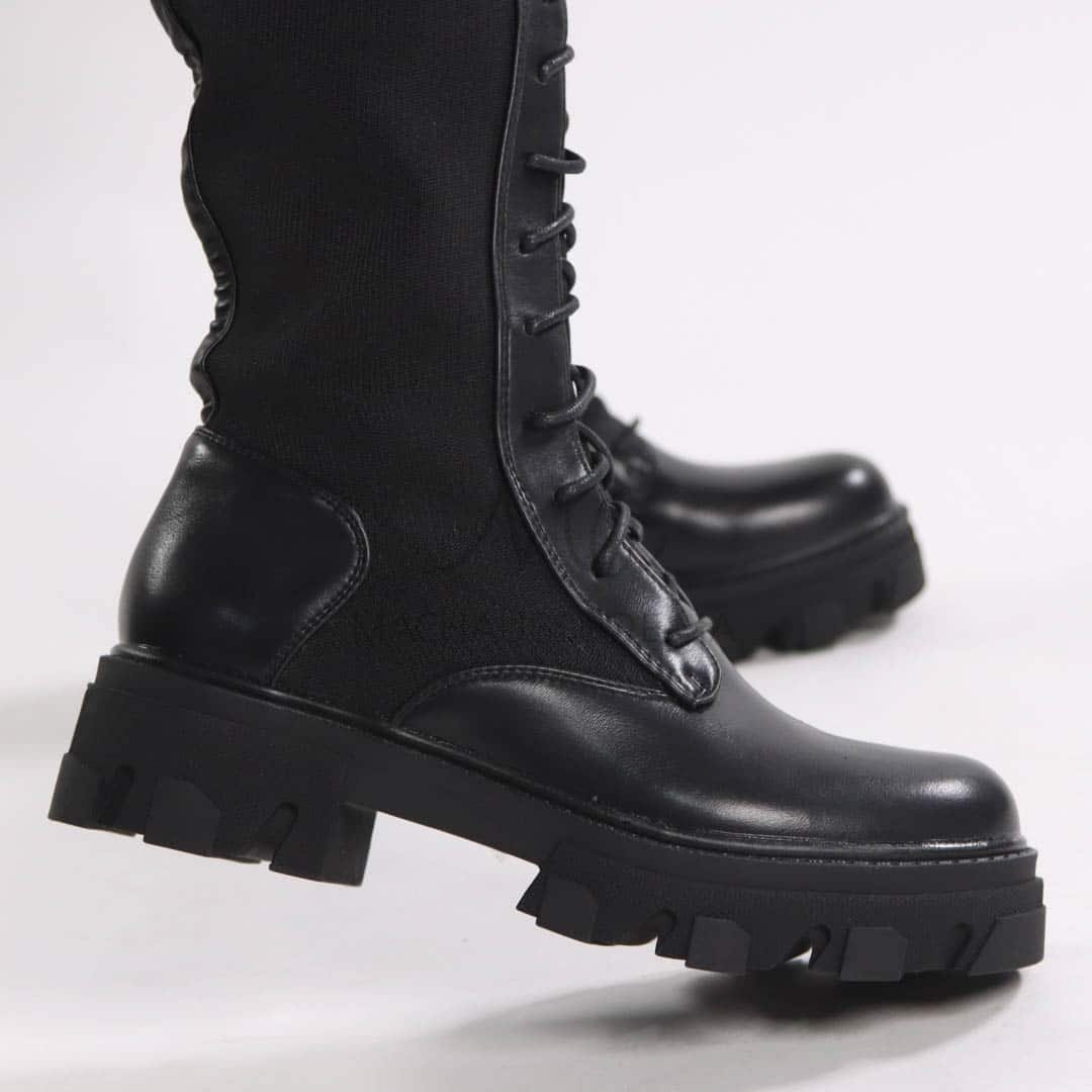 Naya – Bottes à talon en Noir.