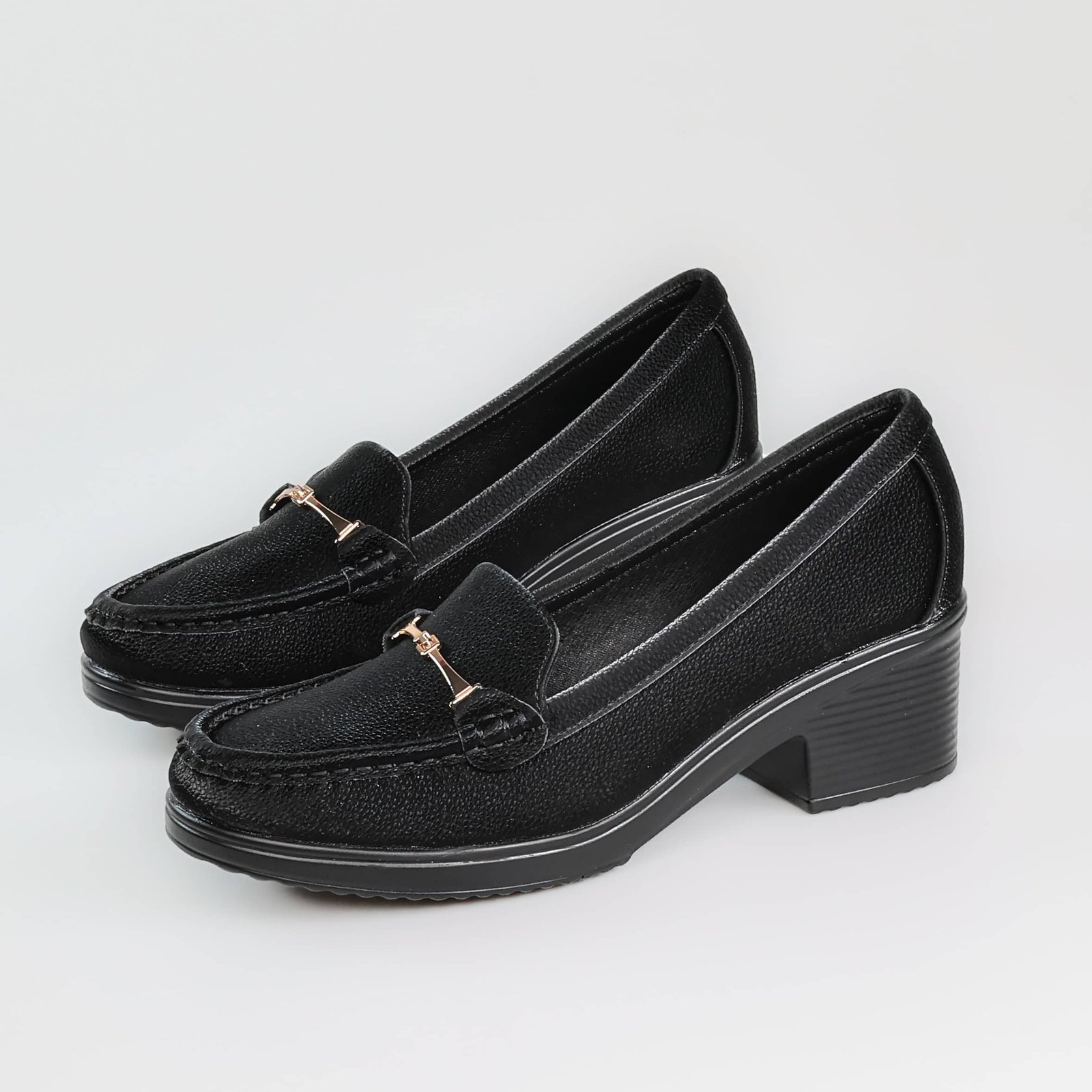 Ocre – Mocassins demi talon en Noir.
