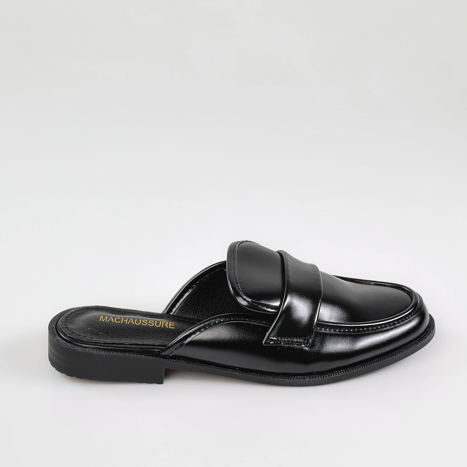 Stèle – Mules femmes en Noir.